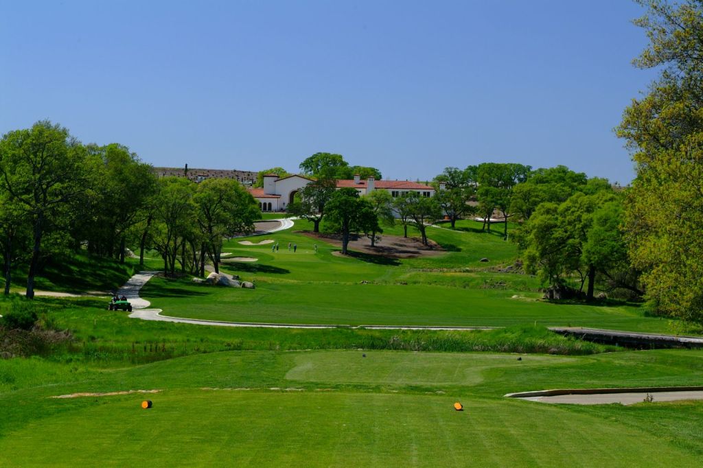 Hole 9 greens with clubhouse in background 